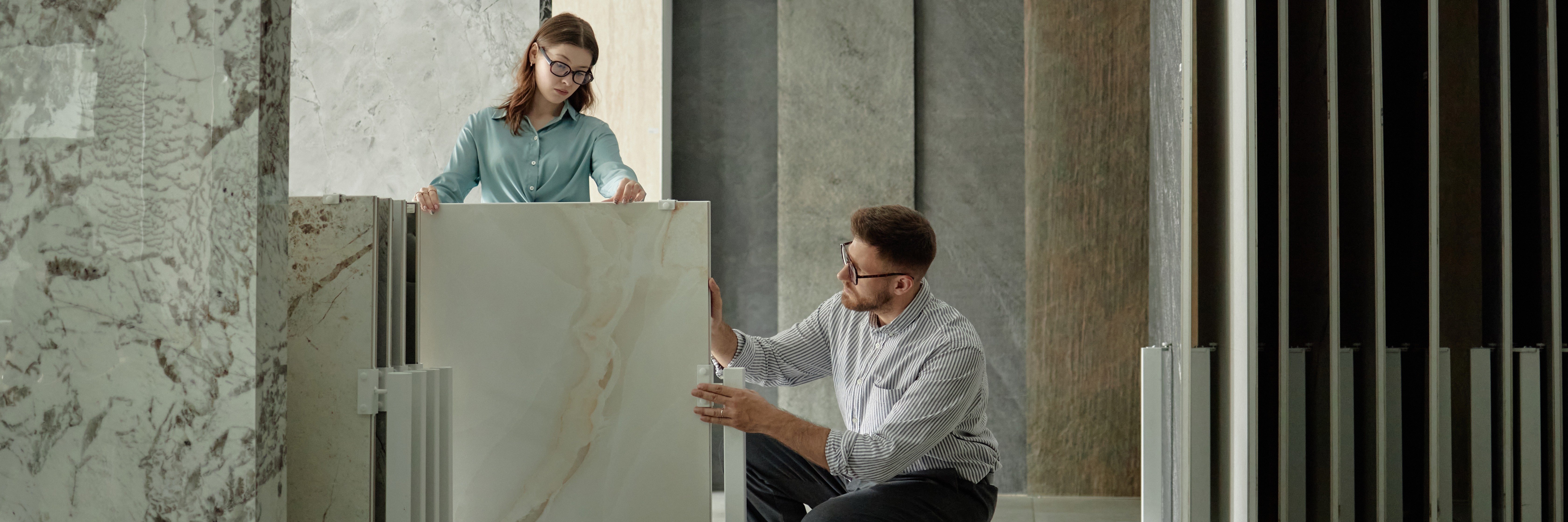 choosing marble slabs in tiles store.